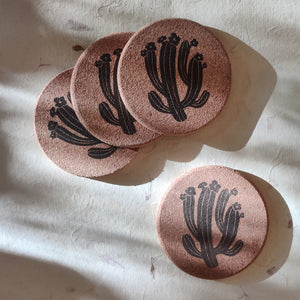 Natural cork coaster with cactus design, perfect for adding charm to eco-conscious homes.