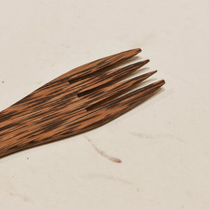 Reusable fork made from reclaimed coconut wood — a sustainable alternative to plastic cutlery.