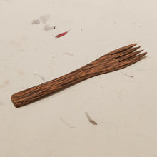 Load image into Gallery viewer, Reusable fork made from reclaimed coconut wood — a sustainable alternative to plastic cutlery.
