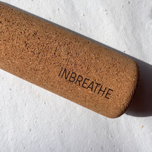 Non-toxic cork yoga roller used for core exercises, body mobility, and posture correction