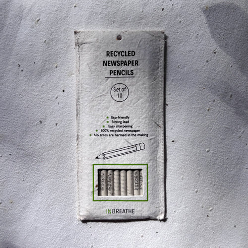 Recycled paper pencils with HB graphite, eco stationery made from newspaper for everyday writing.