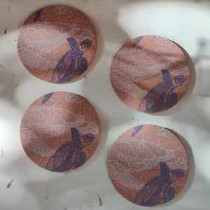 Eco-friendly coasters featuring turtle art, ideal for daily use and hot beverages