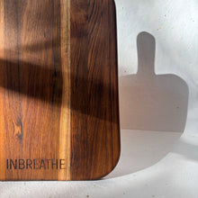 Load image into Gallery viewer, Close-up of eco-friendly teak wood cutting board showing smooth edges, rich grain, and premium finish for sustainable kitchens.
