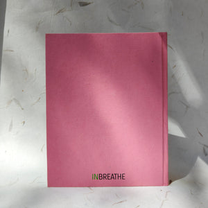 Backside image of handmade paper notebook with pink cover, made from recycled cotton, ideal for bullet journaling