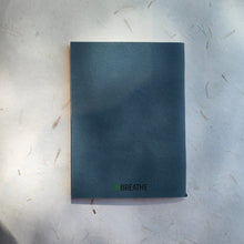 Load image into Gallery viewer, Back view of InBreathe softcover notebook in blue, clean minimal design and eco-friendly finish
