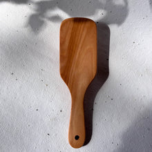 Load image into Gallery viewer, Plastic-free bamboo hairbrush with slim handle and natural bristles for gentle scalp care
