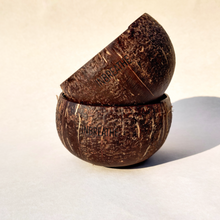 Load image into Gallery viewer, Coconut bowl used for smoothie or dessert, ideal for sustainable snacking and eco-friendly living.
