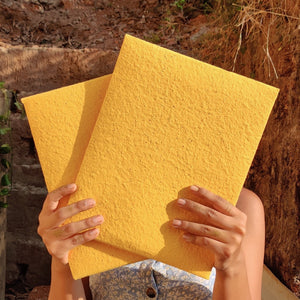 Handmade paper deckle edge sheets packaged in eco-friendly paper folder by InBreathe