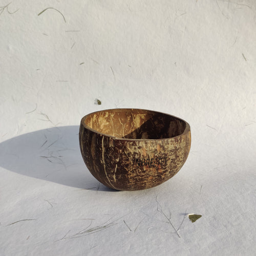 Handcrafted small natural coconut bowl by InBreathe, polished with coconut oil, ethically made from reclaimed shells in India